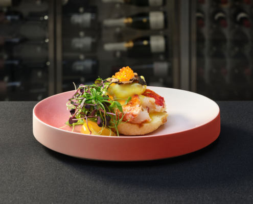 Lobster Eggs Benedict with microgreens and caviar