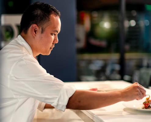 Chef Colin plating a dish.