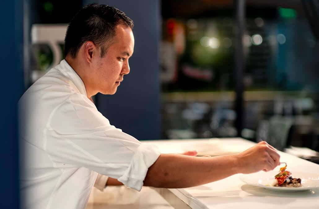 Chef Colin plating a dish.