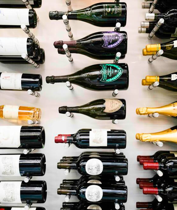 Display of wine bottles in cellar.